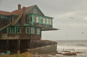 A home poised on the edge in coastal Rhode Island after Superstorm Sandy in 2012. (RI Sea Grant photo)